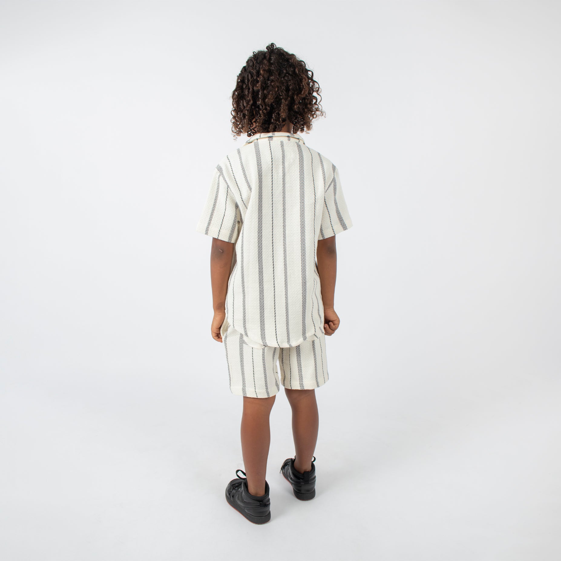 Conjunto niño textura gris