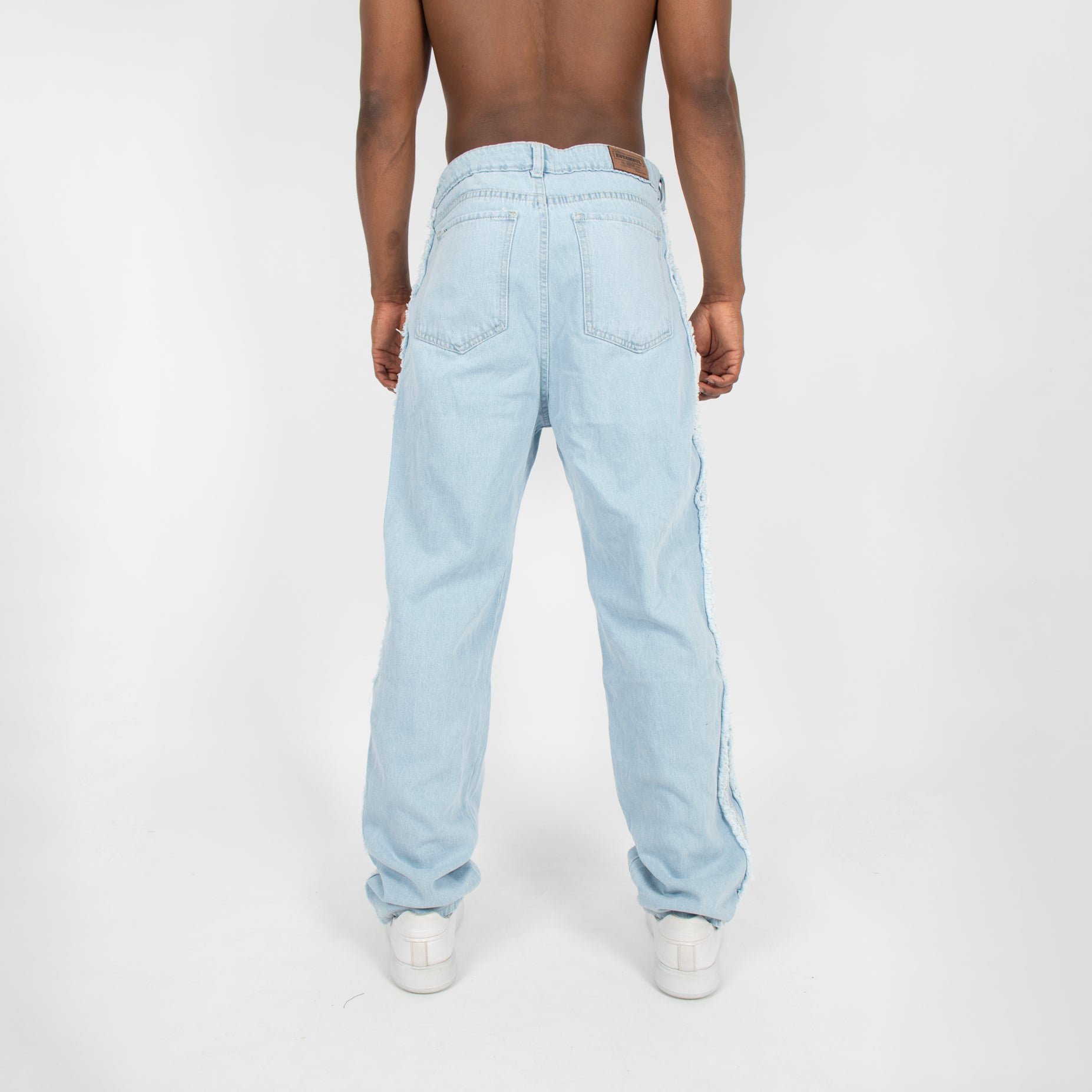 Jean hombre desmechado azul claro