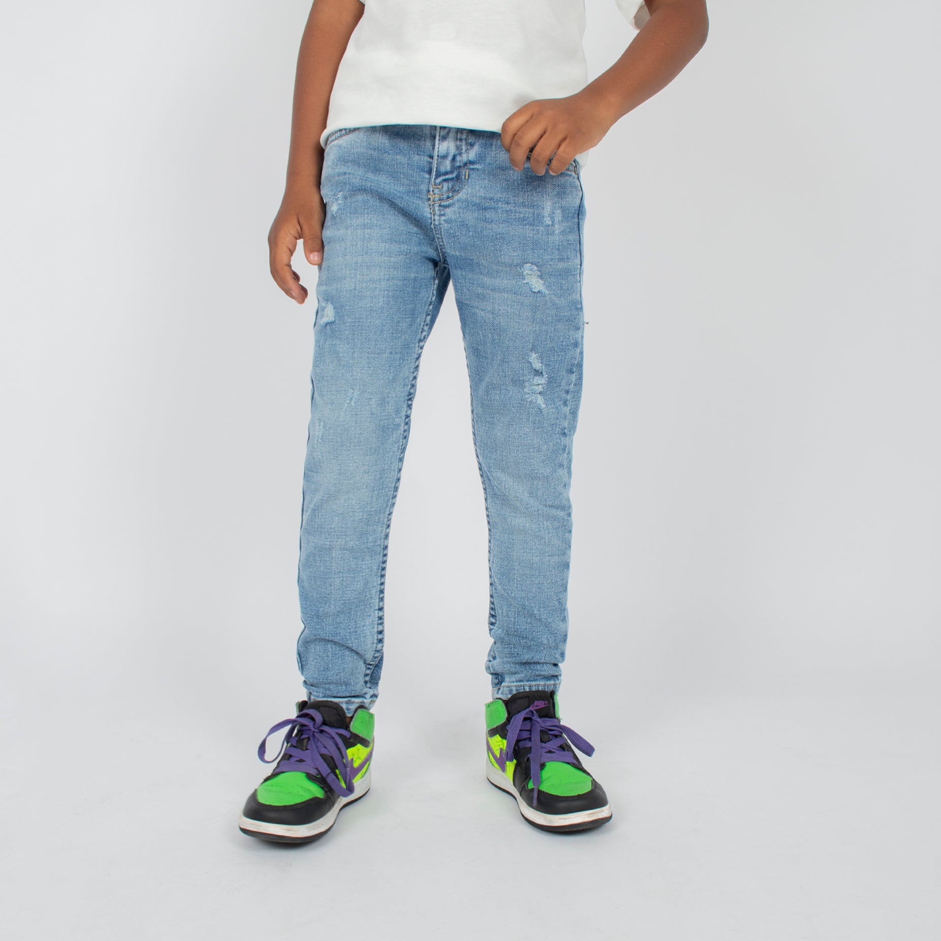 Jean niño skinny claro