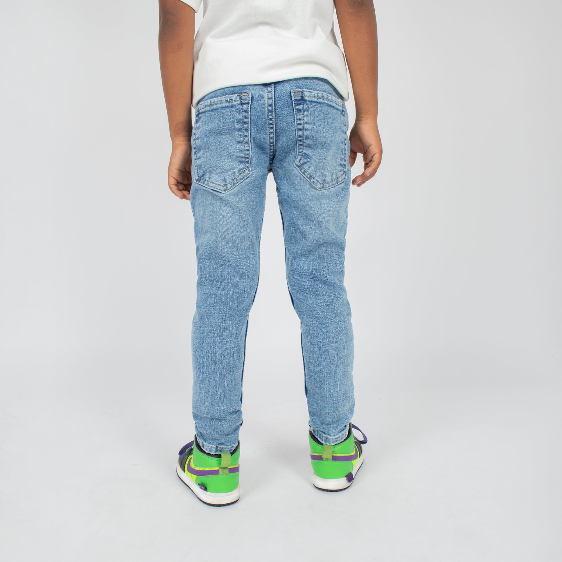 Jean niño skinny claro