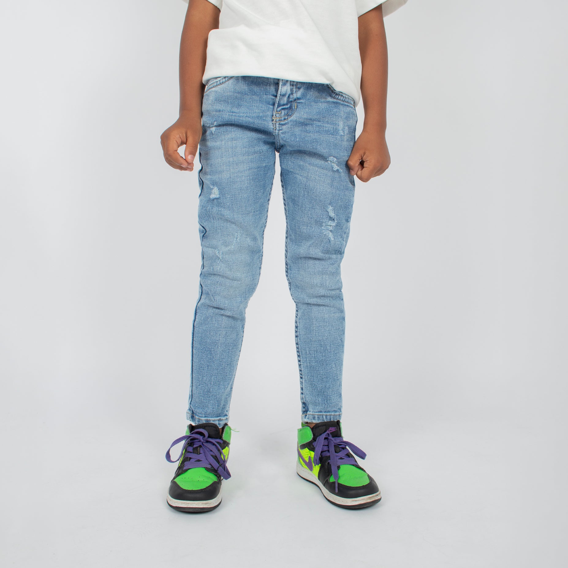 Jean niño skinny claro