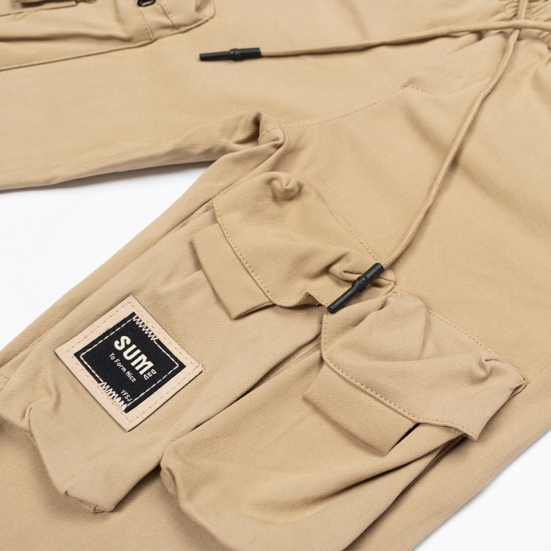 Jogger niño bolsillos camel