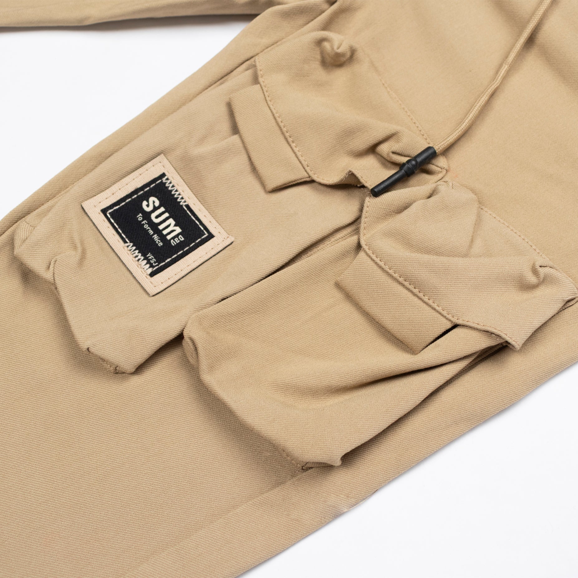 Jogger niño bolsillos camel