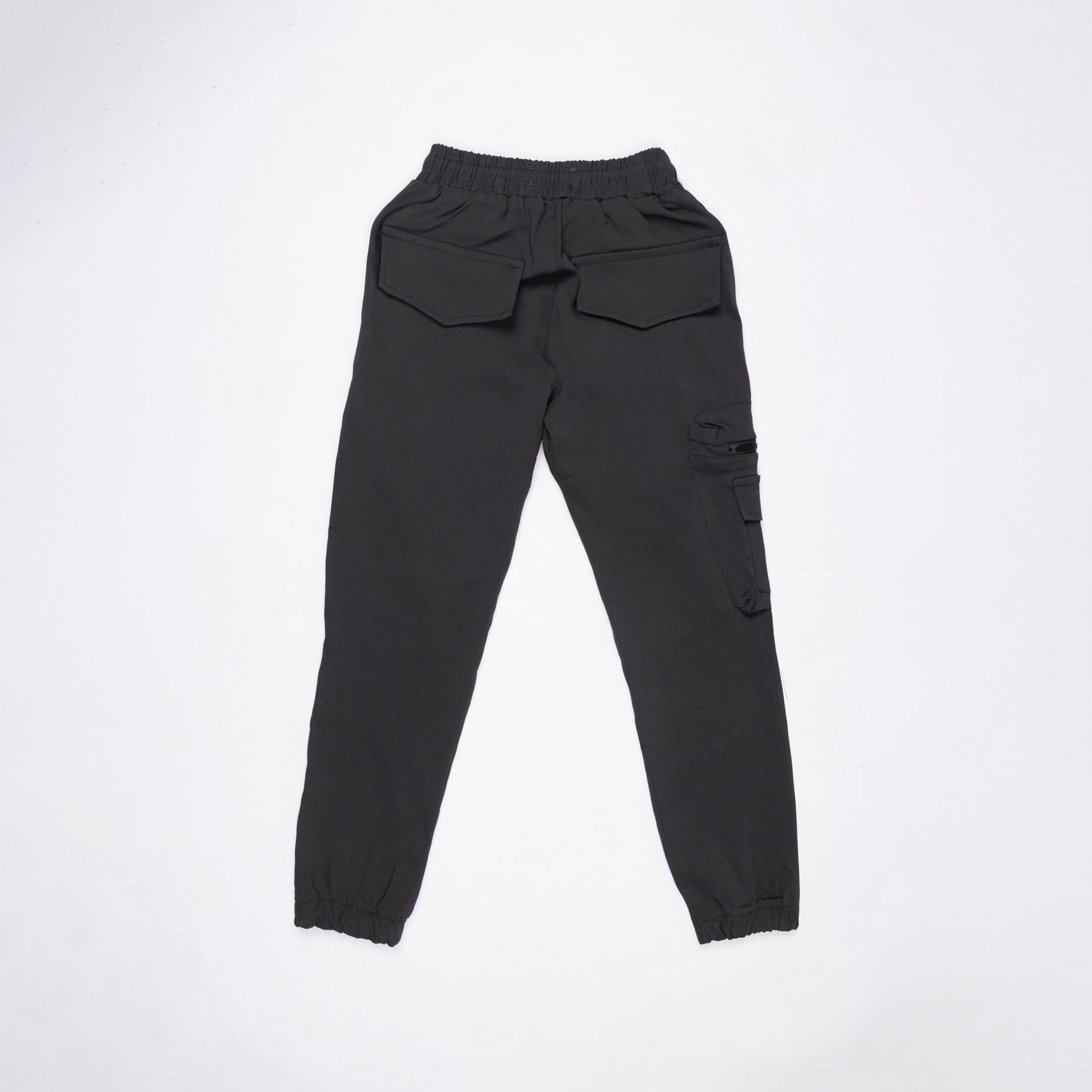 Jogger niño bolsillos gris