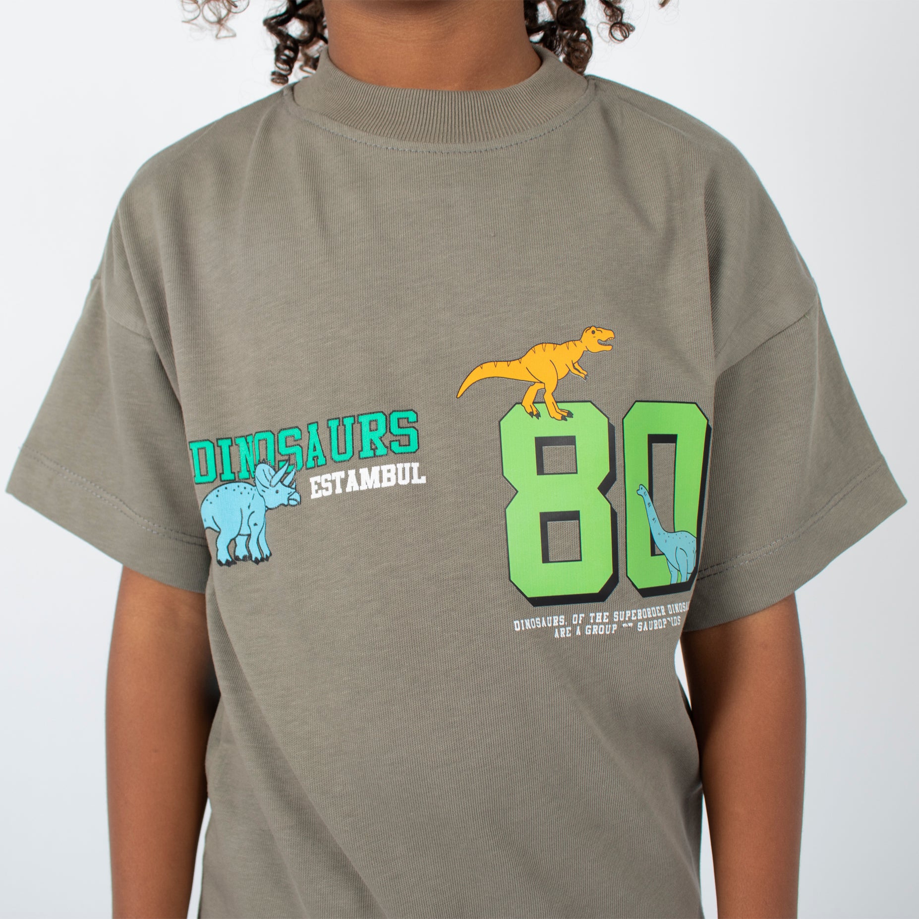 Oversize niño Dinosaurio