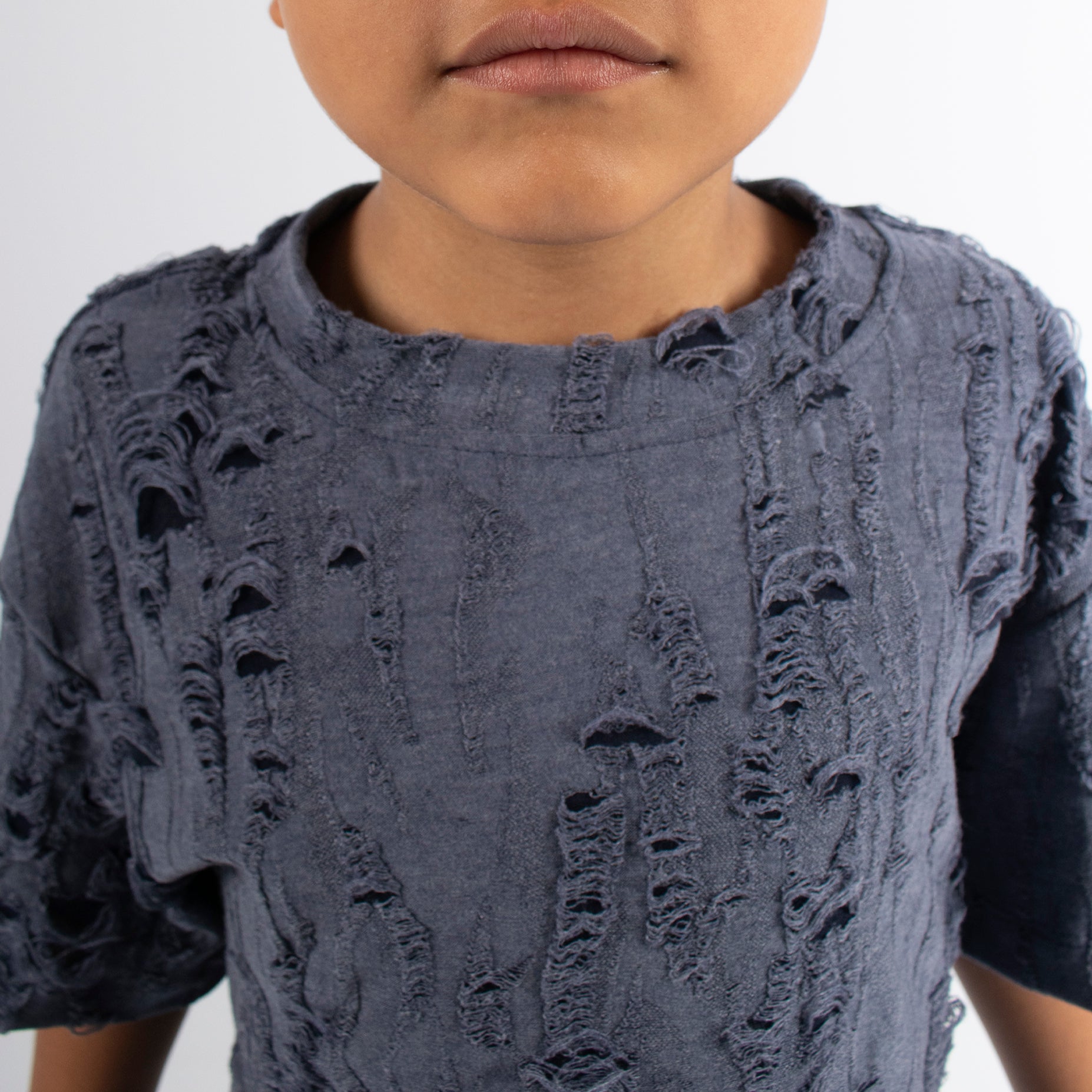 Oversize niño rotos morada