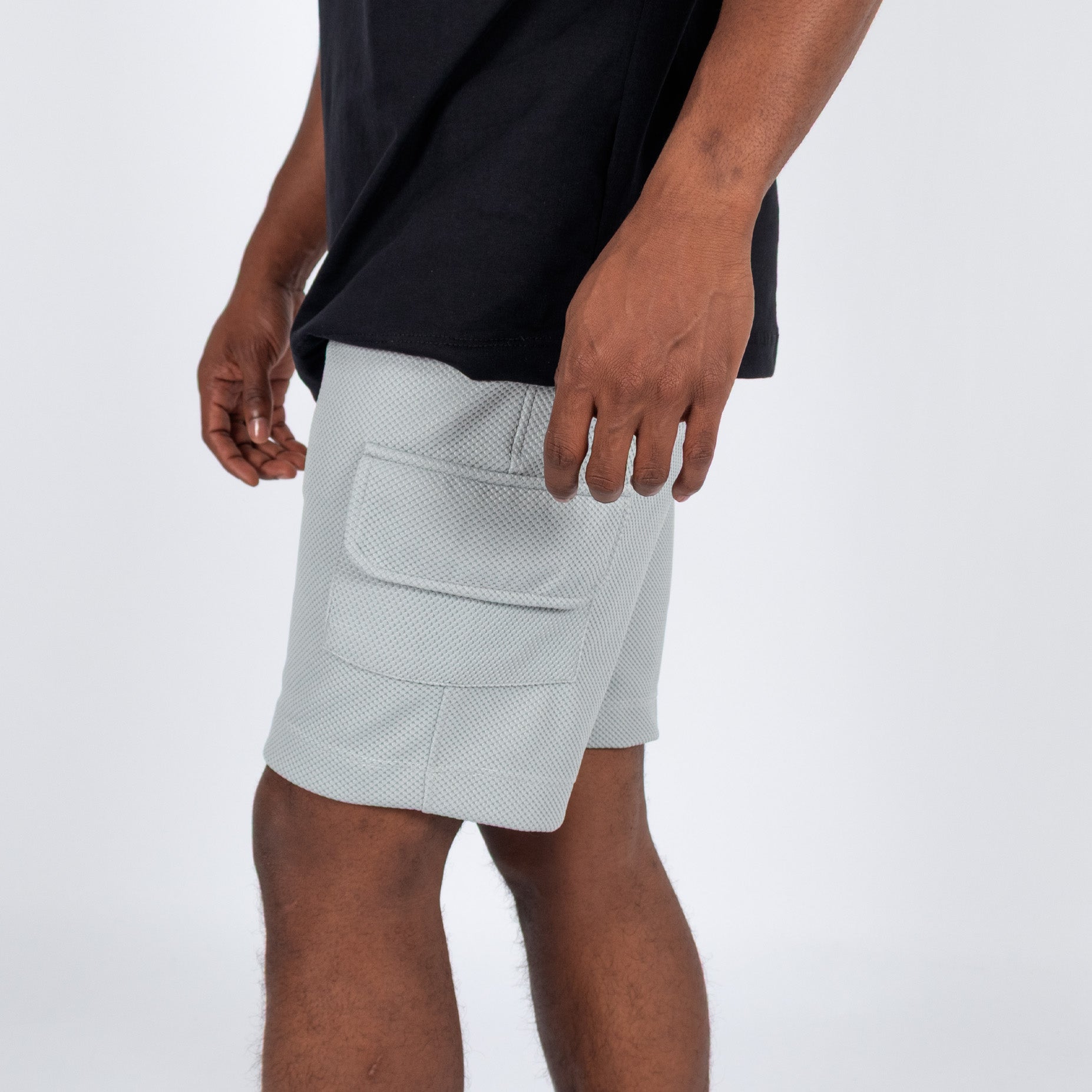 Pantaloneta hombre cargo textura gris