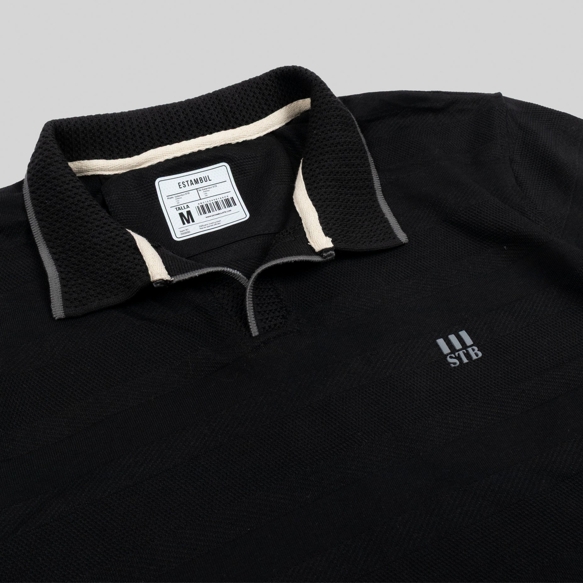 Polo hombre textura y bordado
