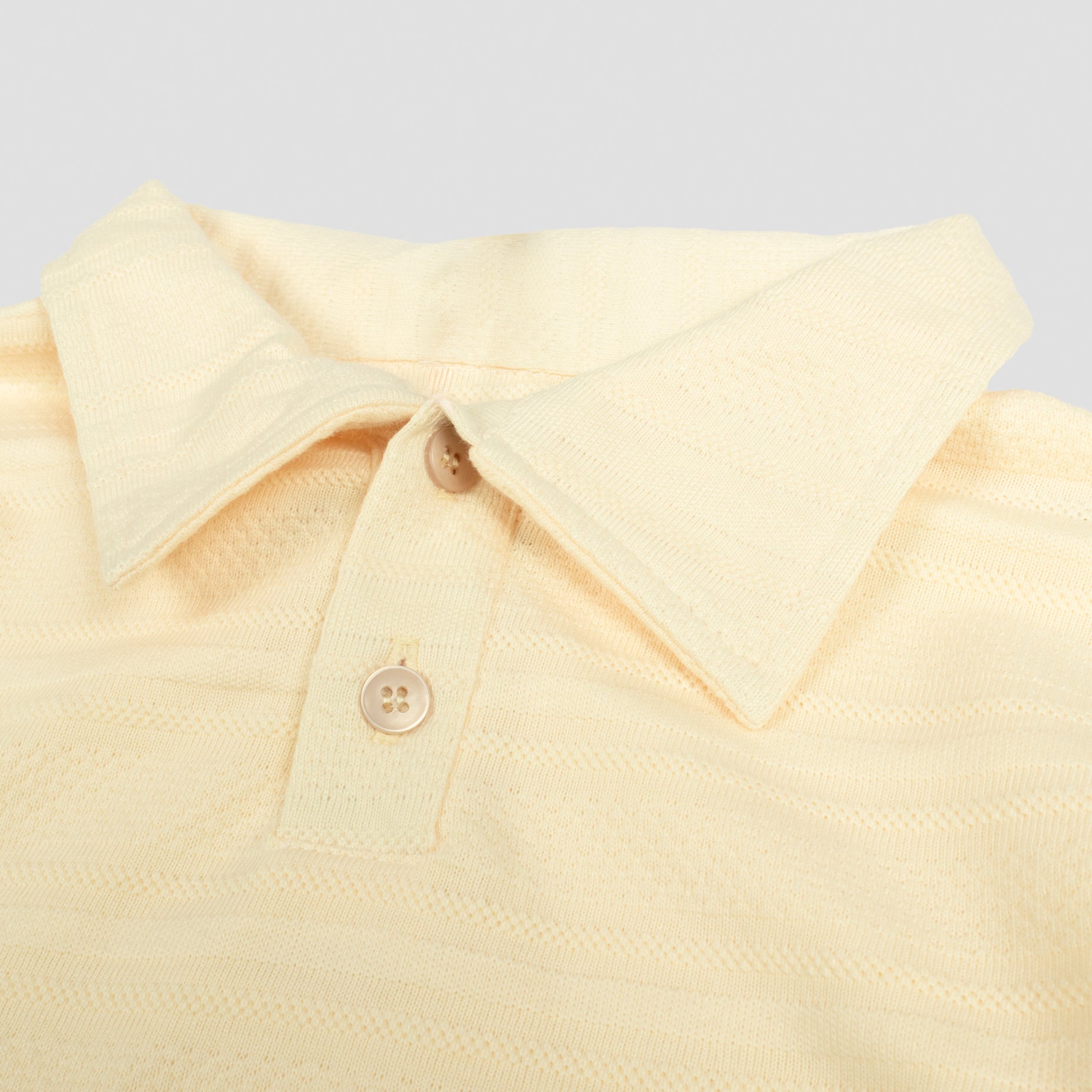 Polo niño textura amarillo